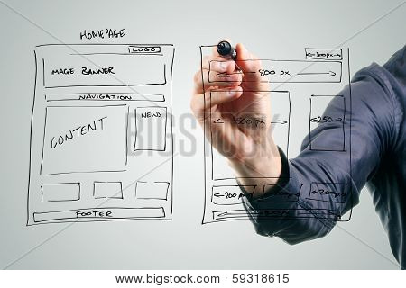 Designer Drawing Website Development Wireframe