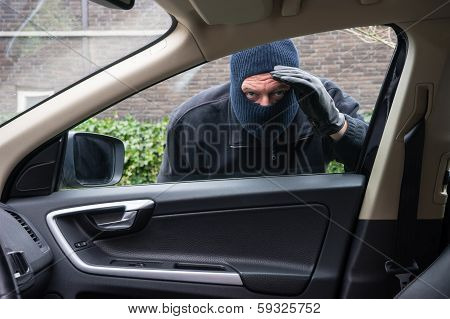 Car Burglar In Action