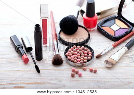 Cosmetics make-up on white wooden. background. Top view mock up.