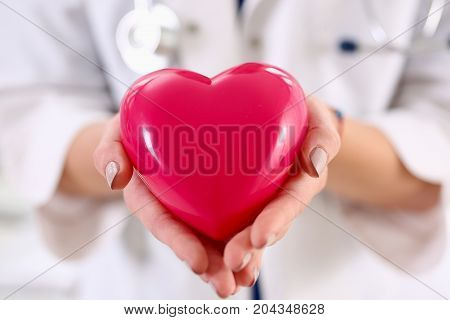 Female Medicine Doctor Hands Holding Red Heart