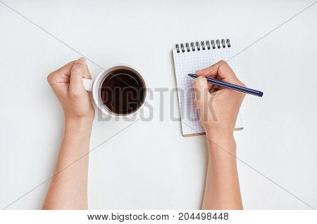 Hand Writing. Woman Writes In Notebook With Pen, Enjoys Good Morning And Hot Tea. Writing Concept. F