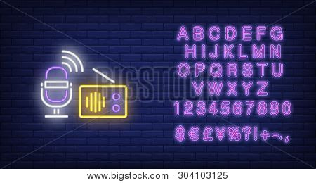 Microphone And Radio Receiver Neon Sign. Glowing Neon Microphone And Radio Receiver On Dark Blue Bri