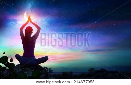 Woman Doing Yoga With Lotus Flowers And Chakra Gradient Colors - Spiritual Contemplation