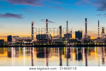 Oil And Gas Refinery Industry Plant With Glitter Lighting And Sunrise In The Morning, Factory Of Pet