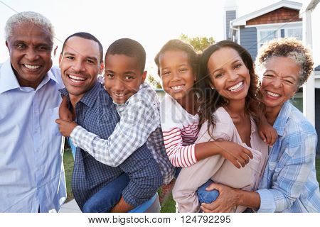 Outdoor group portrait of black multi generation family