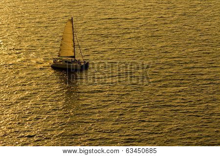 Sailing Yacht Boat On Golden Tropical Sea.