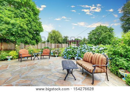 Well Designed Patio Area With Stone Floor.