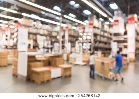 Abstract Motion Customers Shopping At Large Assemble Furniture Store In Usa