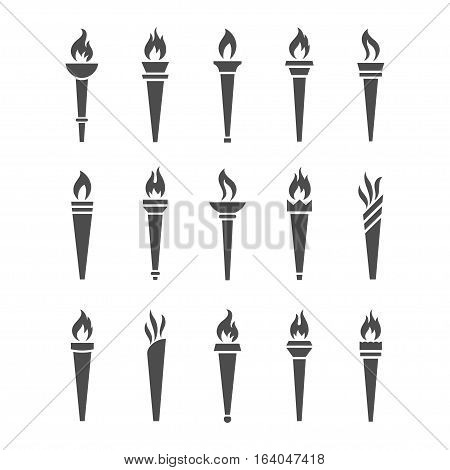 Icons torch with flame isolated vector set. The symbol of victory success or achievement. Silhouettes of various medieval flaming torches.