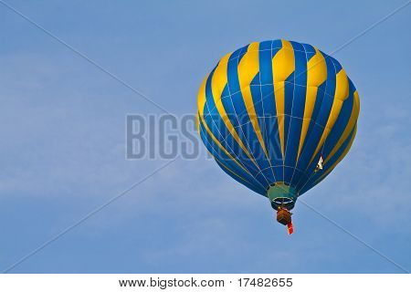 Hot Air Balloon In Cloudy Sky