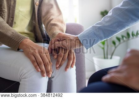 The Hands Of A Psychiatrist Hold The Patient's Hand To Encourage And Encourage Recovery From Depress