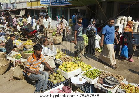 Men sell fruits at the local market in Bandarban, Bangladesh.