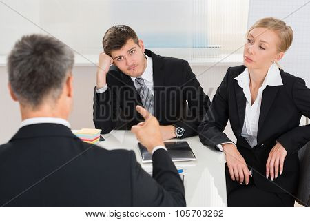 Businesspeople Having Argument At Workplace