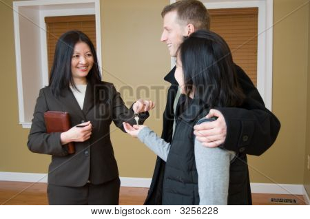 Realtor Giving Key To Couple