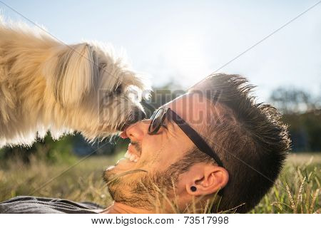 Cool Dog Playing With His Owner