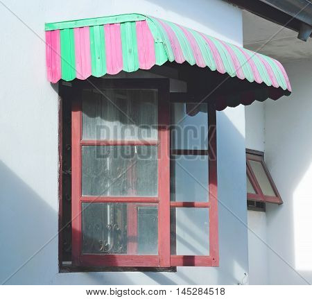 Red And Green Awning Window