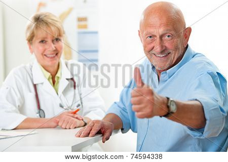 Happy senior patient and doctor at the doctor's office