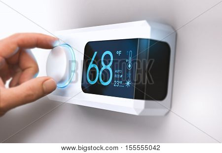 Hand turning a home thermostat knob to set temperature on energy saving mode. fahrenheit units. Composite image between a photography and a 3D background.