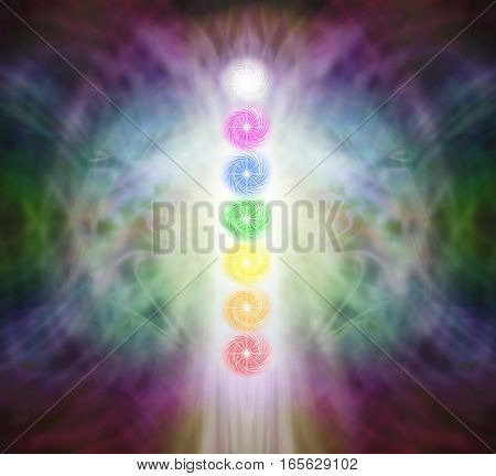 The Seven Chakra Vortexes in a Pranic Energy Field  - column of  seven chakras on a beautiful ethereal energy formation background