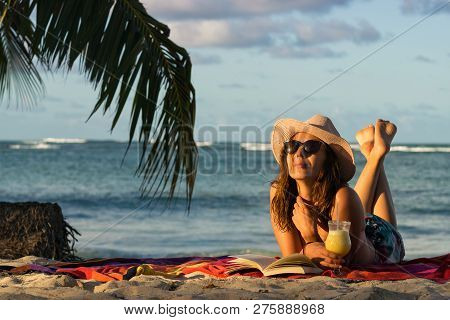 Traveler Girl Relaxing On Tropical Beach. Young Girl Traveler Relaxing In Vacation. Traveler Relaxin