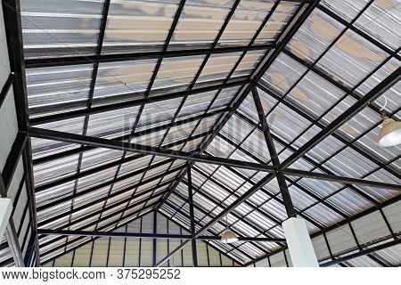 Steel Roof Structure. Moonlight Bulb. Steel Structure With Roof Tiles. Architectural Structure Of Ro