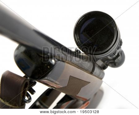 Sniper rifle with scope isolated on white background.