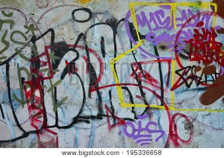 Texture Of A Fragment Of The Wall With Graffiti Painting, Which Is Depicted On It. An Image Of A Pie