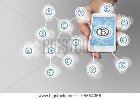 Bitcoin concept on grey background with smartphone as example for fin-tech