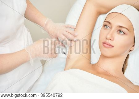 Armpit Injection At Spa Salon. Doctor Hands. Closeup View. High Quality. Pretty Female Patient. Beau