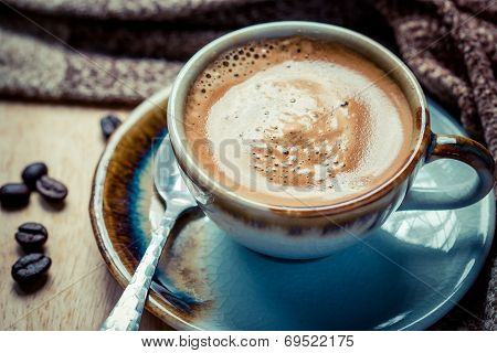 Cup Of Espresso With Coffee Beans