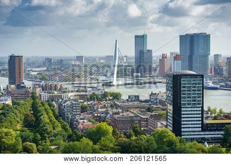 ROTTERDAM, THE NETHERLANDS - Sep. 6, 2017: Rotterdam skyline with Erasmus bridge. Aerial view of Rotterdam, The Netherlands. A major logistic and economic centre, Rotterdam is Europe's largest port.