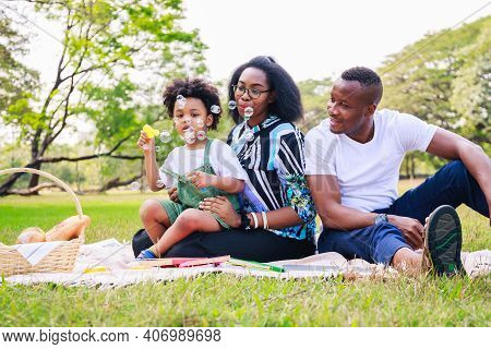 Happy African American Family Life Concept. African American Parents (father, Mother) And Little Boy