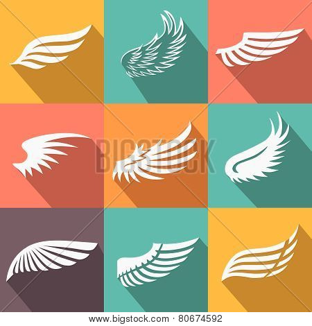 Abstract feather angel or bird wings icons set isolated vector illustration