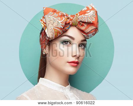 Portrait Of Beautiful Young Woman With Bow