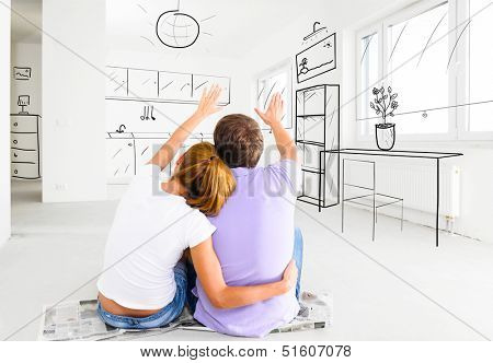 couple at their new empty apartment