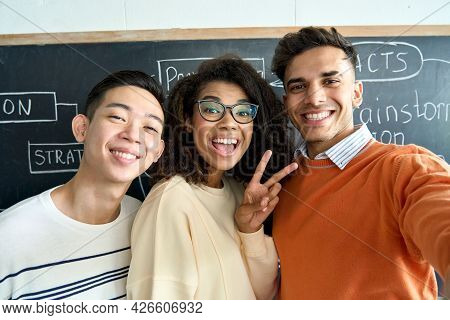 Three Multicultural Young Happy Cheerful Diverse College Students Gen Z Team Having Fun Together Mak