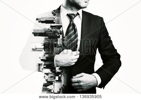 Businessman and city isolated on white background. Black and white image. Double exposure