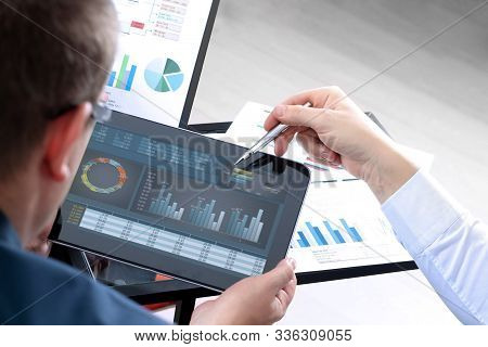 Business Concept. Desktop Computer Making Business Plan, Business Investment Advisor Consulting. Han