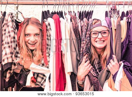 Young Hipster Women At Clothes Flea Market - Best Friends Sharing Fun Time Shopping In The City