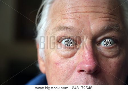 Man with Hypnotic Eyes. A man stares at you with his Hypnotic Eyes, soon you will be Hypnotized.
Hypnosis. 