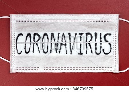 Novel Coronavirus - 2019-ncov, Wuhan Virus Concept. Surgical Mask Protective Mask With Coronavirus T