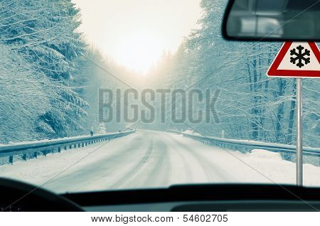 winter driving - snowy country road