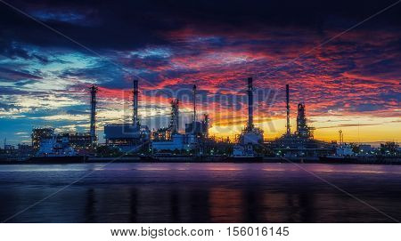 oil refinery industry plant along twilight morning. oil refinery industry reflection. oil refinery on beautiful sky. oil refinery produces gasoline. oil refinery in Bangkok Thailand.