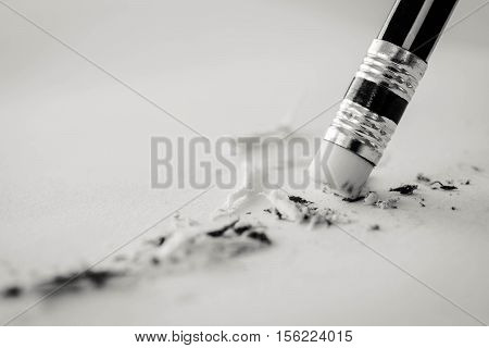 Pencil Eraser. Pencil Eraser Removing A Written Mistake On A Piece Of Paper, Mistake Concept, Black