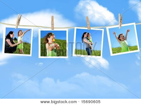 Photographies de famille suspendu à une corde à linge contre un ciel bleu