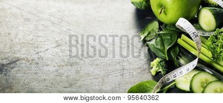 Fresh green vegetables on vintage background - detox, diet or healthy food concept