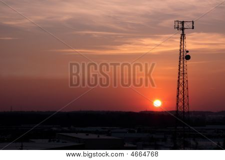 Dark Orange Cell Phone Tower Silhouette