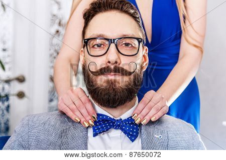 Old-fashioned Man With A Beard And Curled Mustache