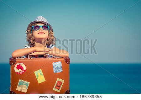 Child With Vintage Suitcase On Summer Vacation