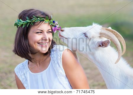 Funny Picture A Beautiful Young Girl Farmer With White Goat.